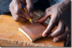 Making an adinkra stamp from calabash, Ntonso, Ghana.