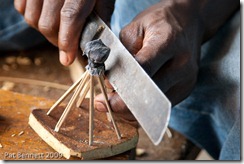 Making an adinkra stamp from calabash, Ntonso, Ghana.